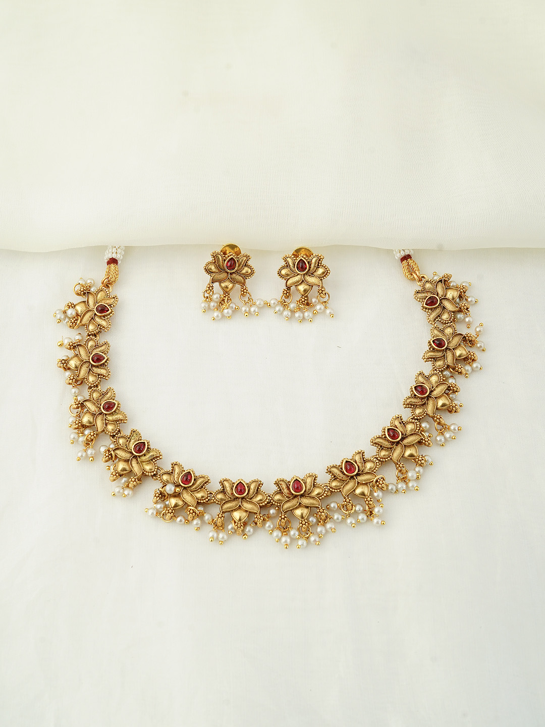 GOLD TANNED LOTUS NECKLACE