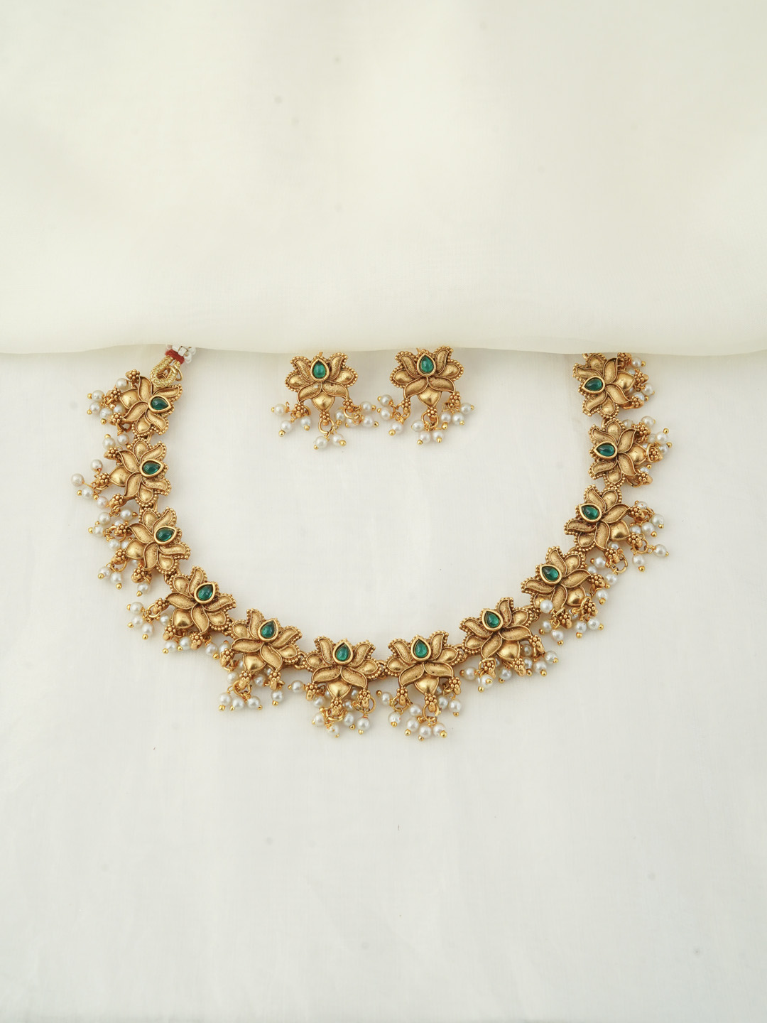 GOLD TANNED LOTUS NECKLACE